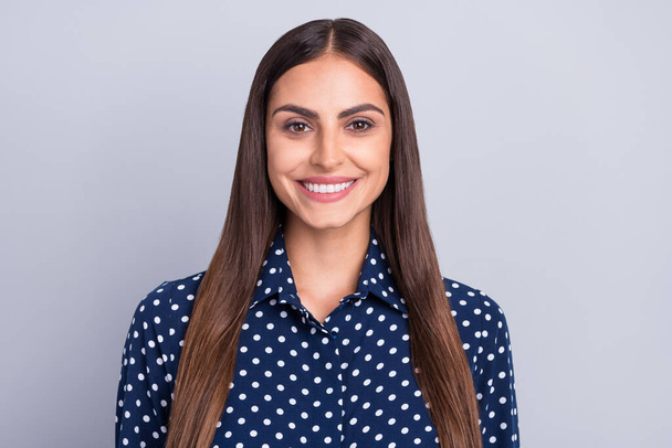 Photo of young happy cheerful woman wear dotted blue shirt smile good mood isolated on grey color background - Φωτογραφία, εικόνα