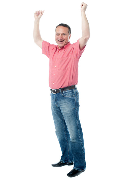 Mature gentleman with raised arms - Фото, изображение