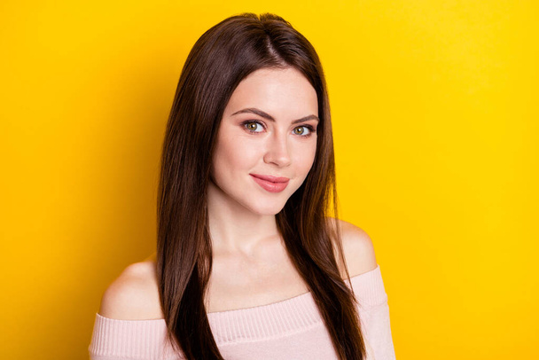 Photo of optimistic brunette lady wear pink shirt isolated on yellow color background - Фото, зображення