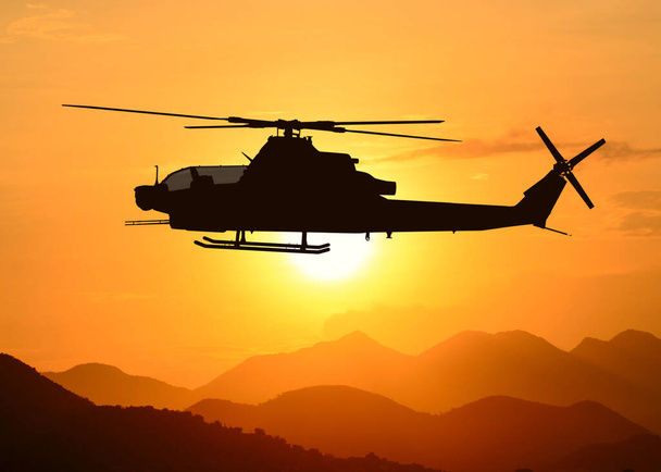 American attack helicopter silhouette in the flight - Photo, Image