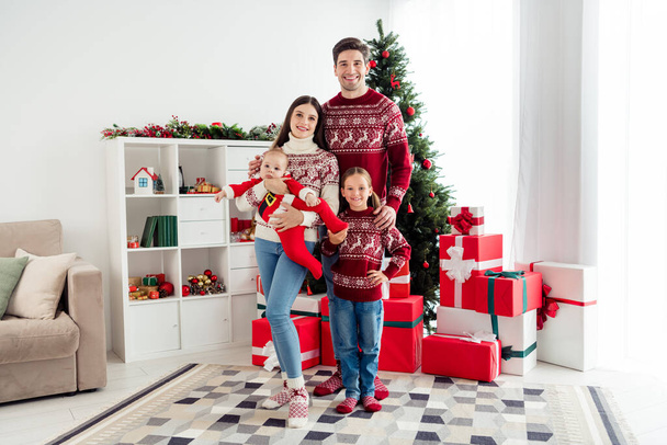 Full body photo of young family happy positive smile sister brother together holiday decoration indoors - Foto, immagini