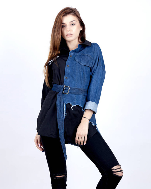 girl posing in studio with modern fashionable shirt  - Фото, зображення