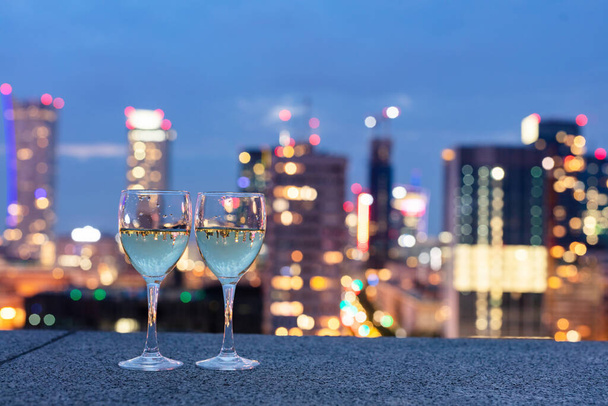 Wine with view on Warsaw, Poland at night. Luxury travel - Photo, Image