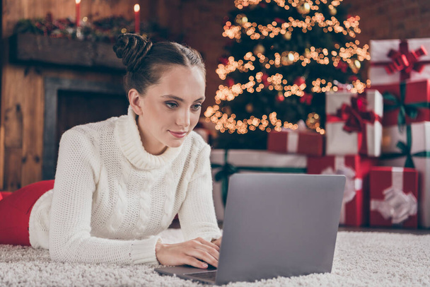 Profile side photo of young girl happy positive smile chat type laptop email wish greeting merry christmas atmosphere indoors - Foto, imagen