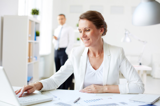 Businesswoman at workplace - Photo, Image