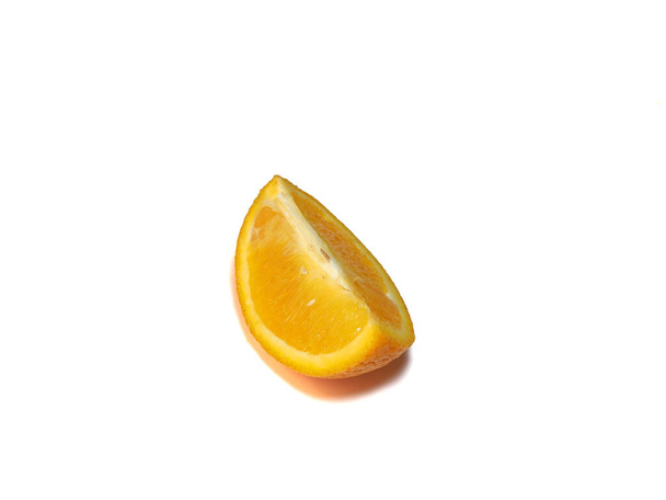 Rebanada de naranja. Frutas. Vitaminas. Producto respetuoso con el medio ambiente - Foto, Imagen