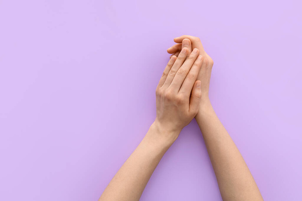 Female hands on color background - Photo, Image