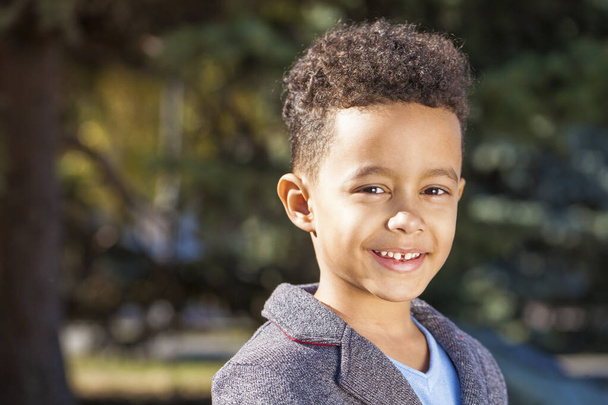 Close up portrait of little boy in autumn park - Φωτογραφία, εικόνα