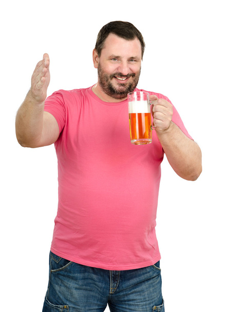 Jolly man toasting with light beer mug - Photo, Image