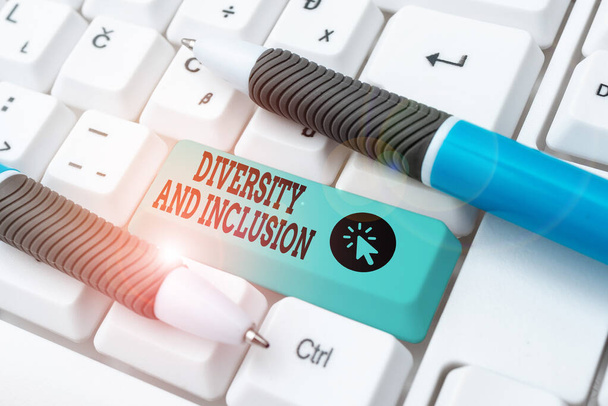 Text showing inspiration Diversity And Inclusion. Business overview range human difference includes race ethnicity gender Typing Certification Document Concept, Retyping Old Data Files - Photo, Image