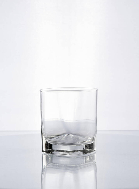 A shaped glass goblet for whis on a white background - Fotoğraf, Görsel