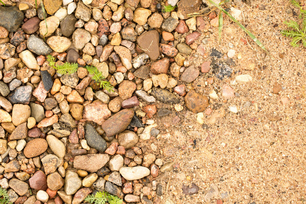 Texture of small pebbles and sand, beautiful small pebbles - Foto, Bild