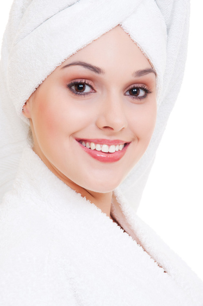 Smiley woman in white bathrobe - Foto, afbeelding