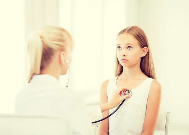 doctor with stethoscope listening to the patient - Photo, image