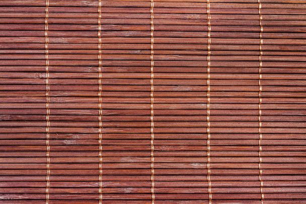Foto texture di marrone tappetino di bambù colorato. - Foto, immagini