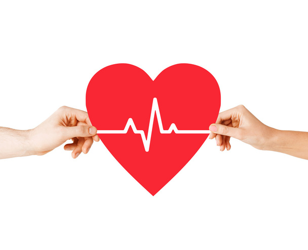 hands holding heart with ecg line - Photo, image