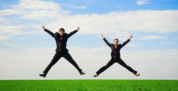 Two happy colleagues in jump - Photo, Image