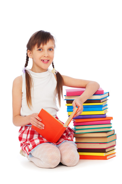 Смайлик школярка сидить біля книг - Фото, зображення