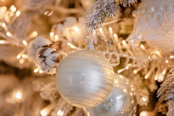 Christmas tree festively decorated with balls   - Фото, зображення