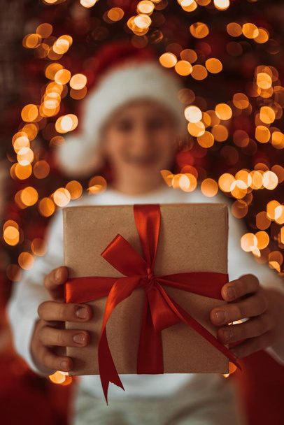 kid holding christmas gift - Photo, Image