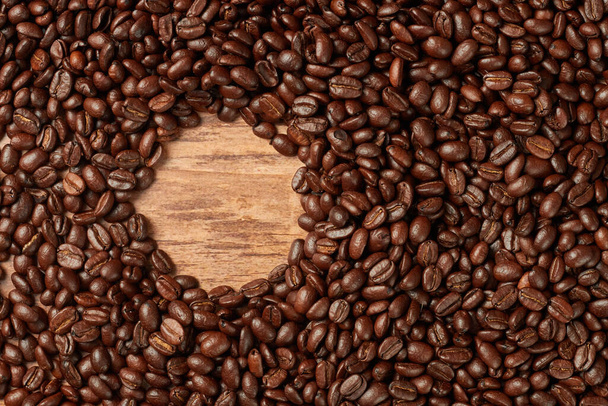 The coffee beans with a circle for copy space - Fotó, kép