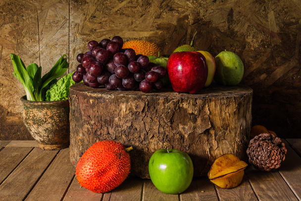 Still life with on the timber full of fruit - Photo, Image