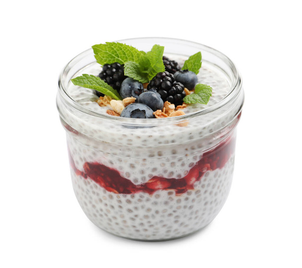 Delicious chia pudding with berries and granola on white background - Фото, зображення
