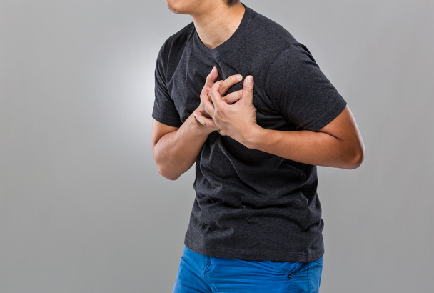 Mann erleidet Herzinfarkt - Foto, Bild