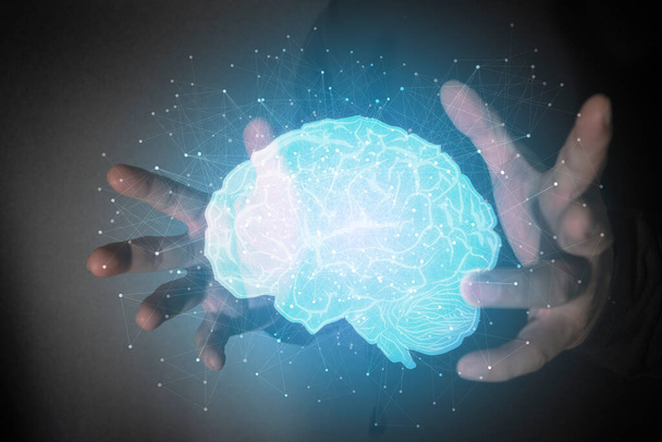 Businessman hands holding abstract polygonal brain on dark background. Artificial mind concept - Zdjęcie, obraz
