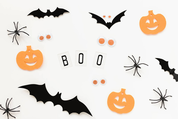 Pumpkins, spiders and bats on white background - Photo, image