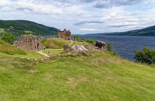 Scottish tourist attraction - Ruins of Urquhart Castle on the western shore of Loch Ness (site of many Nessie sightings) - Drumnadrochit, Highland, Scotland, United Kingdom - 18th of July 2021 - Photo, Image