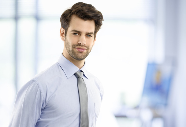 Businessman standing at office - Photo, Image