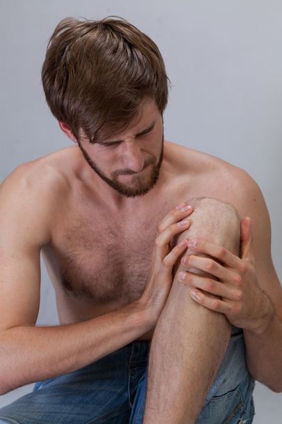 Man with hurting knee - Foto, Imagen