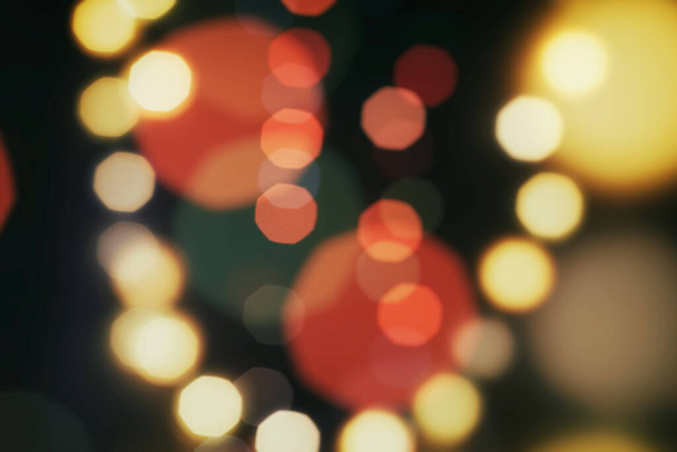 Holiday Christmas glowing color lights with sparkles, blurred bright Christmas abstract bokeh - Fotoğraf, Görsel