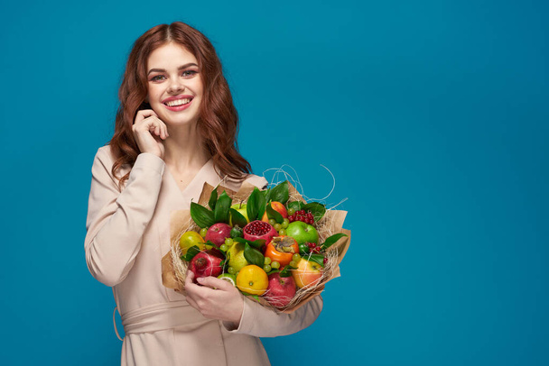 attractive woman fashionable hairstyle bouquet of flowers decoration colorful background - Valokuva, kuva