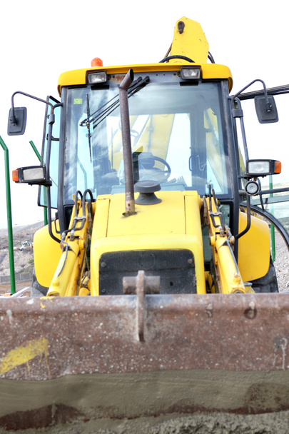 sárga traktor - Fotó, kép