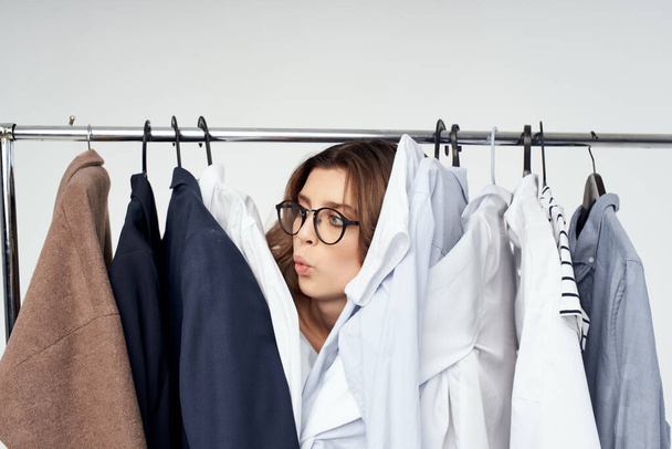 emotional woman clothes hanger dresser fashion interior studio lifestyle - Фото, зображення
