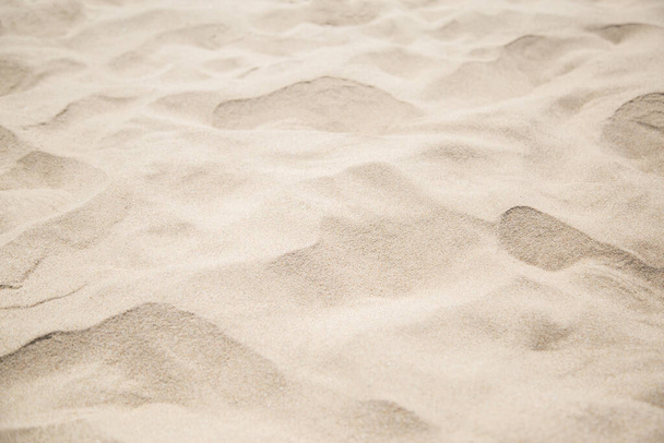 Areia de praia fina no verãoFundo com espaço de cópia e textura de areia visível. - Foto, Imagem