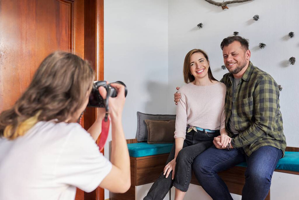 Family holiday date, happy middle-aged couple embracing posing looking into photocamera - Valokuva, kuva