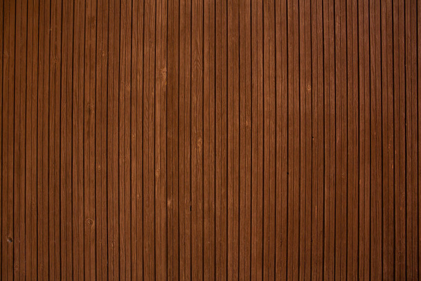 Vintage bruin hout achtergrond textuur met knopen en nagel gaten.Vintage houten donkere horizontale planken. - Foto, afbeelding