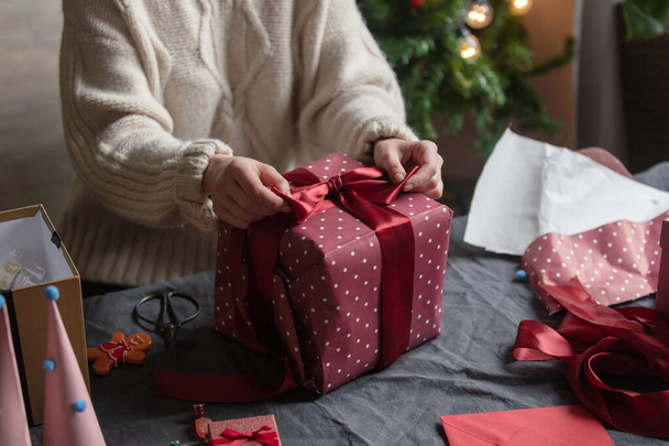 blond hair woman packing gifts at home  - Foto, Imagem