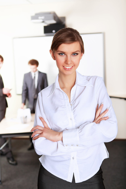 A young business woman in office - Photo, image