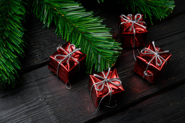 Vintage Christmas decorations set, on black wooden table background - 写真・画像