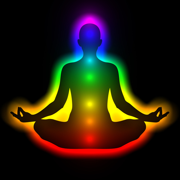 Silhueta de mulher em meditação com aura e chakras
 - Foto, Imagem
