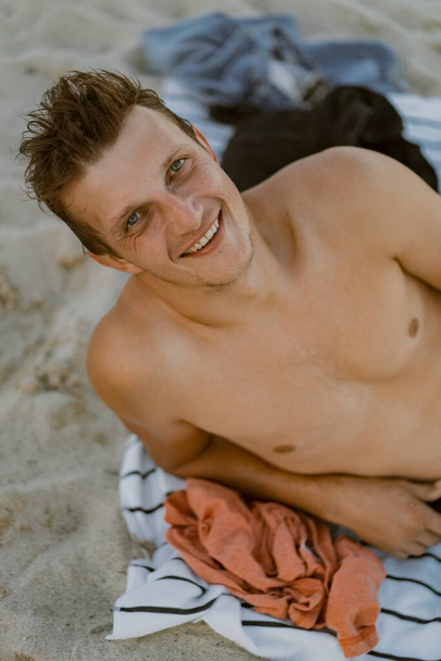 Beach Miami Florida USA, a young man resting on the beach in a s - Φωτογραφία, εικόνα