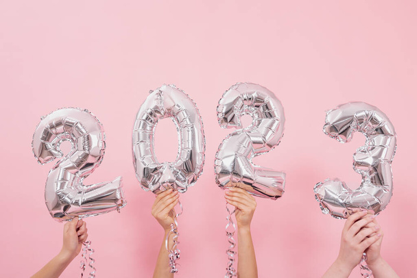 Festive balloons in from the numbers 2023 on a pink background. - Photo, Image