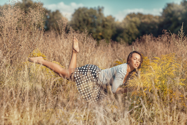 Girl flying over the meadow - Photo, Image