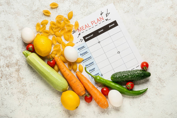 Healthy products and meal plan on light background - Photo, Image