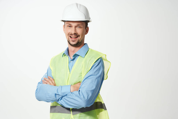 Male builder Professional working uniform light background - Fotografie, Obrázek