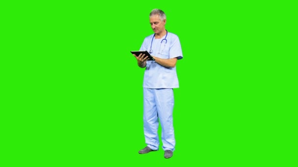 Male hospital surgeon using tablet - Footage, Video